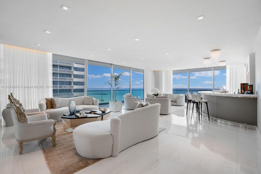 Introducing this stunning direct oceanfront corner residence at Bal Harbour’s most prestigious address. Floor to ceiling sliding glass doors frame endless ocean and city views, and open up to an expansive 1,500SF wrap-around terrace for seamless indoor-outdoor living. Offering the building’s premier floorplan, the exquisitely finished flow-through N. Tower retreat spans 4,185SF with 3 beds and 4.5 baths. Indulge in luxury with private elevator entry and foyer, a new gourmet kitchen showcasing Gaggenau appliances, custom entertaining bar, oversized master suite with walk-in closets, and spa-inspired bath. Oceana offers an exclusive lifestyle with resort-style amenities including Olympic-style pool, world-class spa, 2 clay tennis courts, restaurant, 24-hour concierge and security.