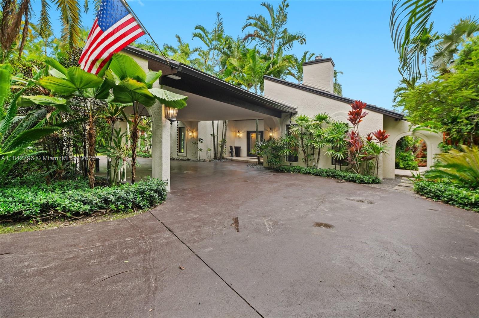 Lush Redlands Oasis. Welcome to a home where privacy, peace & nature reign supreme. Nestled on over a 1/2 acre of thriving tropical beauty w/a stunning waterfall grotto, koi pond & butterfly garden as its centerpiece, this residence is a study in beauty, space & tranquility. Passing thru the grand entrance, you’re greeted by a striking rock garden atrium. Immediately you feel it - this is a special place. A Grand Living Wing comprising a flow-thru family rm, dining rm & showpiece kitchen w/Bosch appliances, granite counters & waterfall island set the scene for a life of indulgent comfort enhanced by earth tones, rich wood flrs, high sloped ceilings, interesting design details, glass drs w/stunning nature views, and a breezeway patio connecting garden, pool & Guest House. Fenced & gated.
