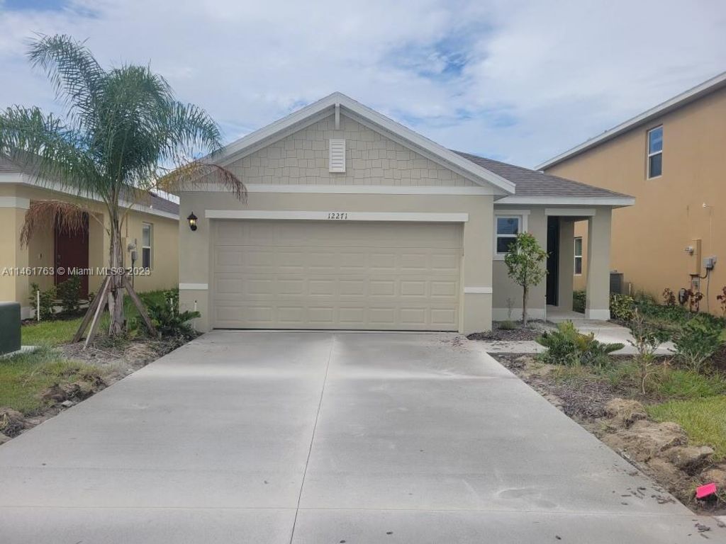 Photo of 12271 SW Rimini Way, Port Saint Lucie, FL 34987 (MLS # A11461763)