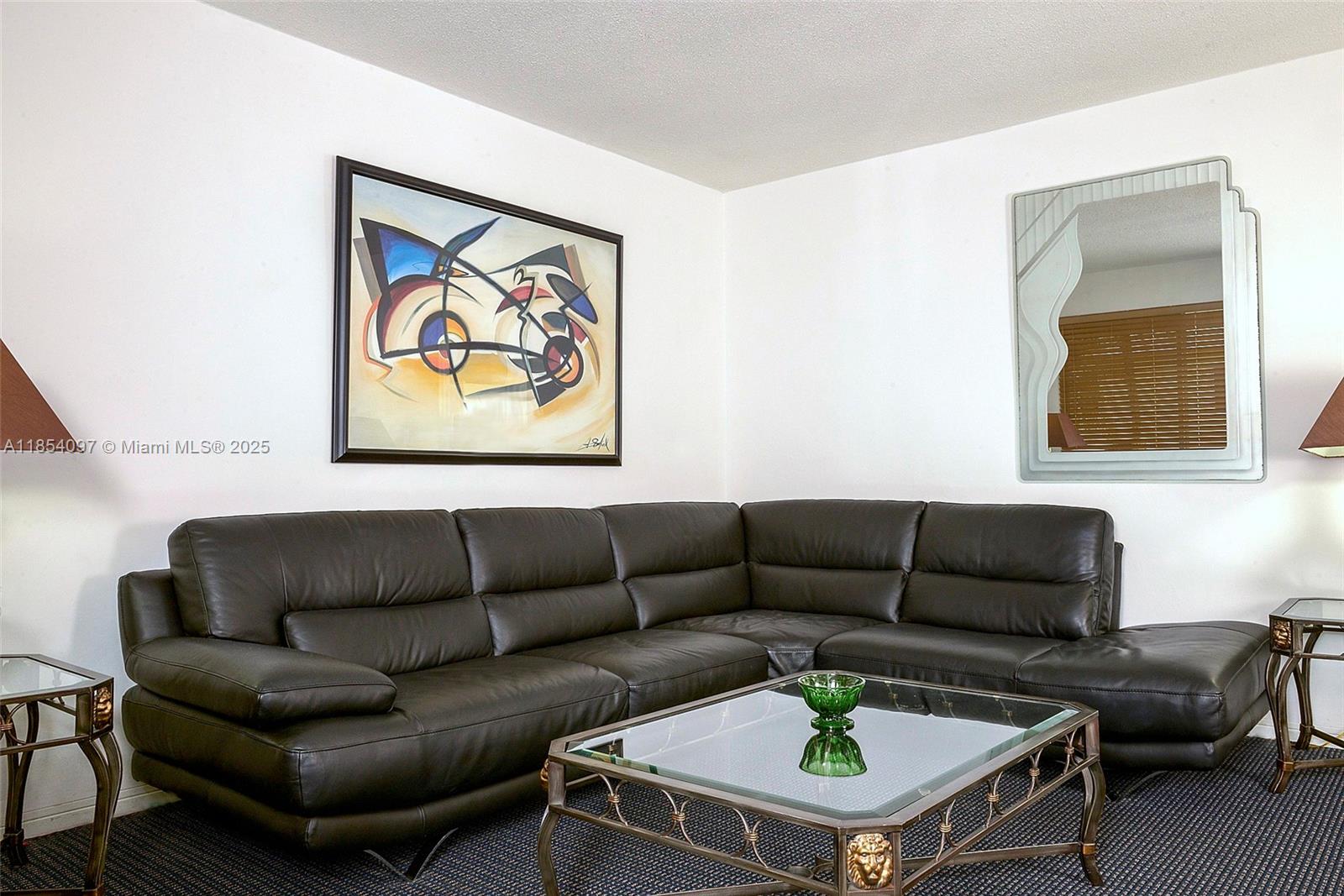 This beautiful corner unit is available right away. Fully furnished, first floor unit, bright, and ready to move-in. All tiled throughout and nicely furnished. Wifi and cable included. Close to major highways, beach, grocery stores and more. Owner is requesting good credit.