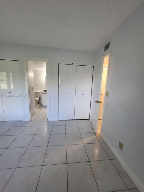 Photo of 11484 Royal Palm Blvd #11484, Coral Springs, FL 33065 (MLS # A11884599)