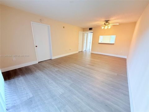 Photo of 12551 SW 16th Ct #105C, Pembroke Pines, FL 33027 (MLS # A11947494)