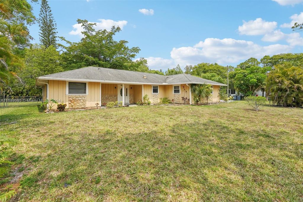 Photo of 4151 N 121st Ter N, Royal Palm Beach, FL 33411 (MLS # A11589995)