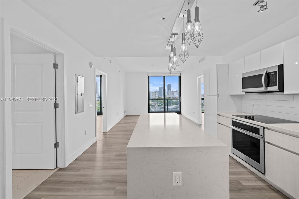 Photo of 101 Diplomat Pkwy #604, Hallandale Beach, FL 33009 (MLS # A11999774)