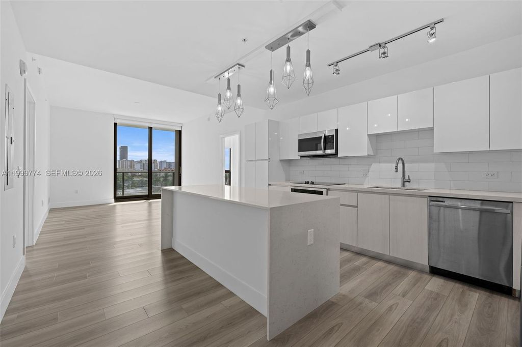 Photo of 101 Diplomat Pkwy #604, Hallandale Beach, FL 33009 (MLS # A11999774)