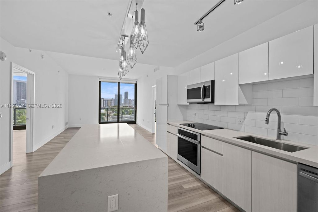 Photo of 101 Diplomat Pkwy #604, Hallandale Beach, FL 33009 (MLS # A11999774)