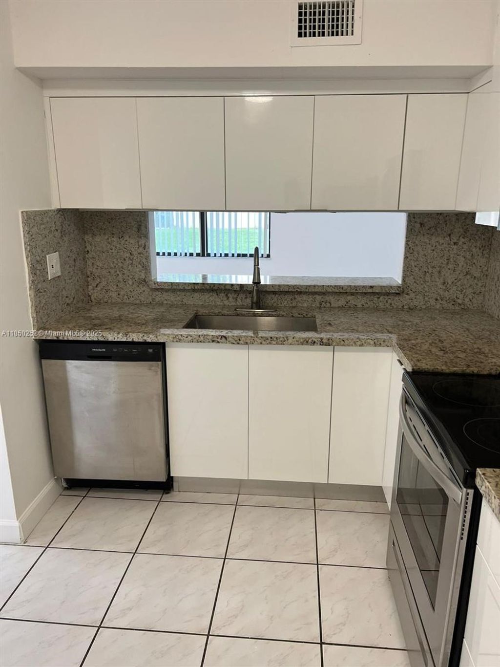 Photo of 3199 Foxcroft Rd #102, Miramar, FL 33025 (MLS # A11850252)