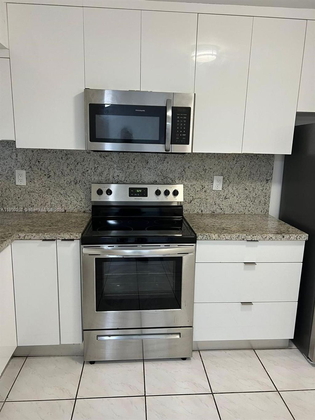 Photo of 3199 Foxcroft Rd #102, Miramar, FL 33025 (MLS # A11850252)