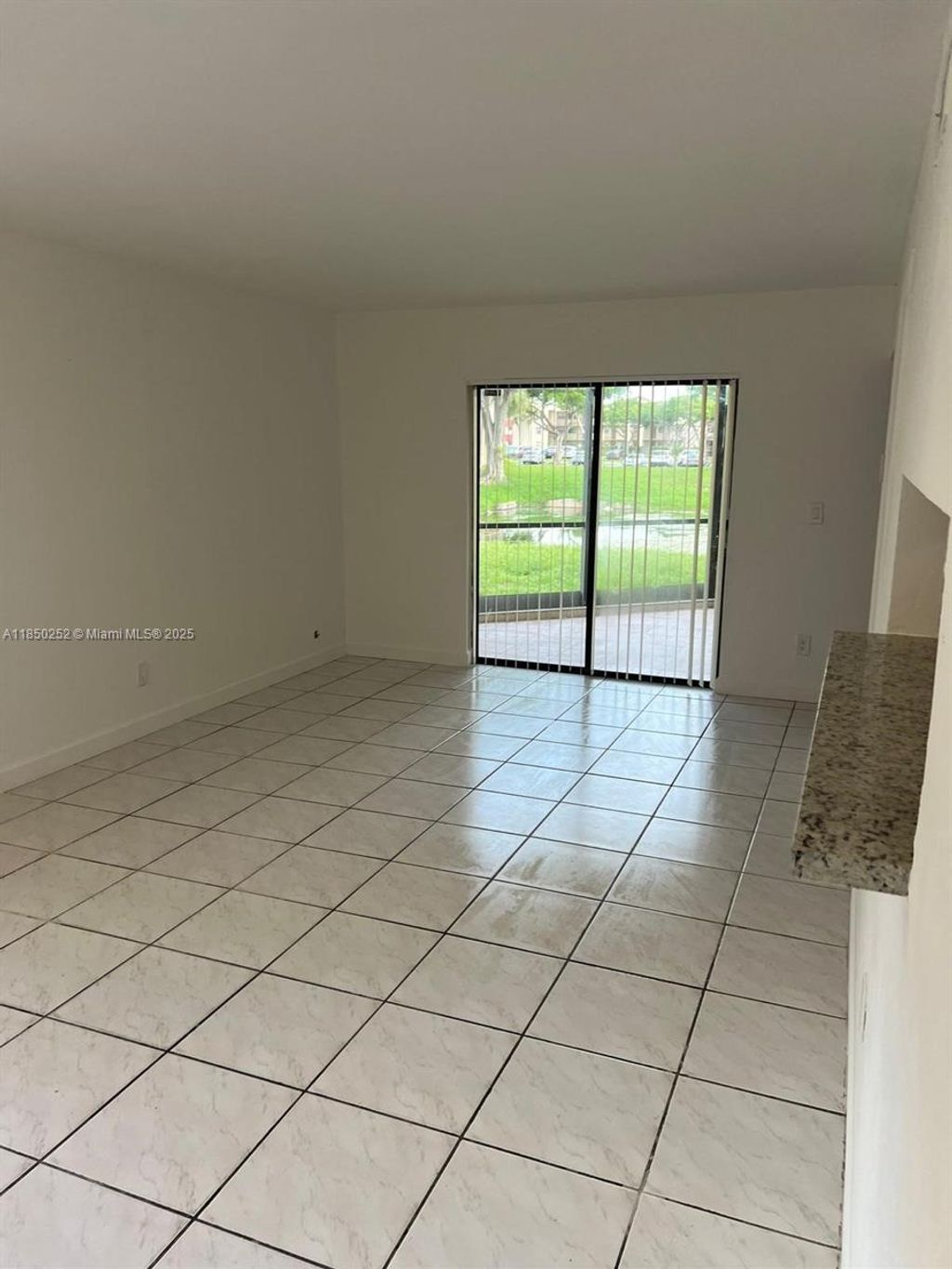 Photo of 3199 Foxcroft Rd #102, Miramar, FL 33025 (MLS # A11850252)