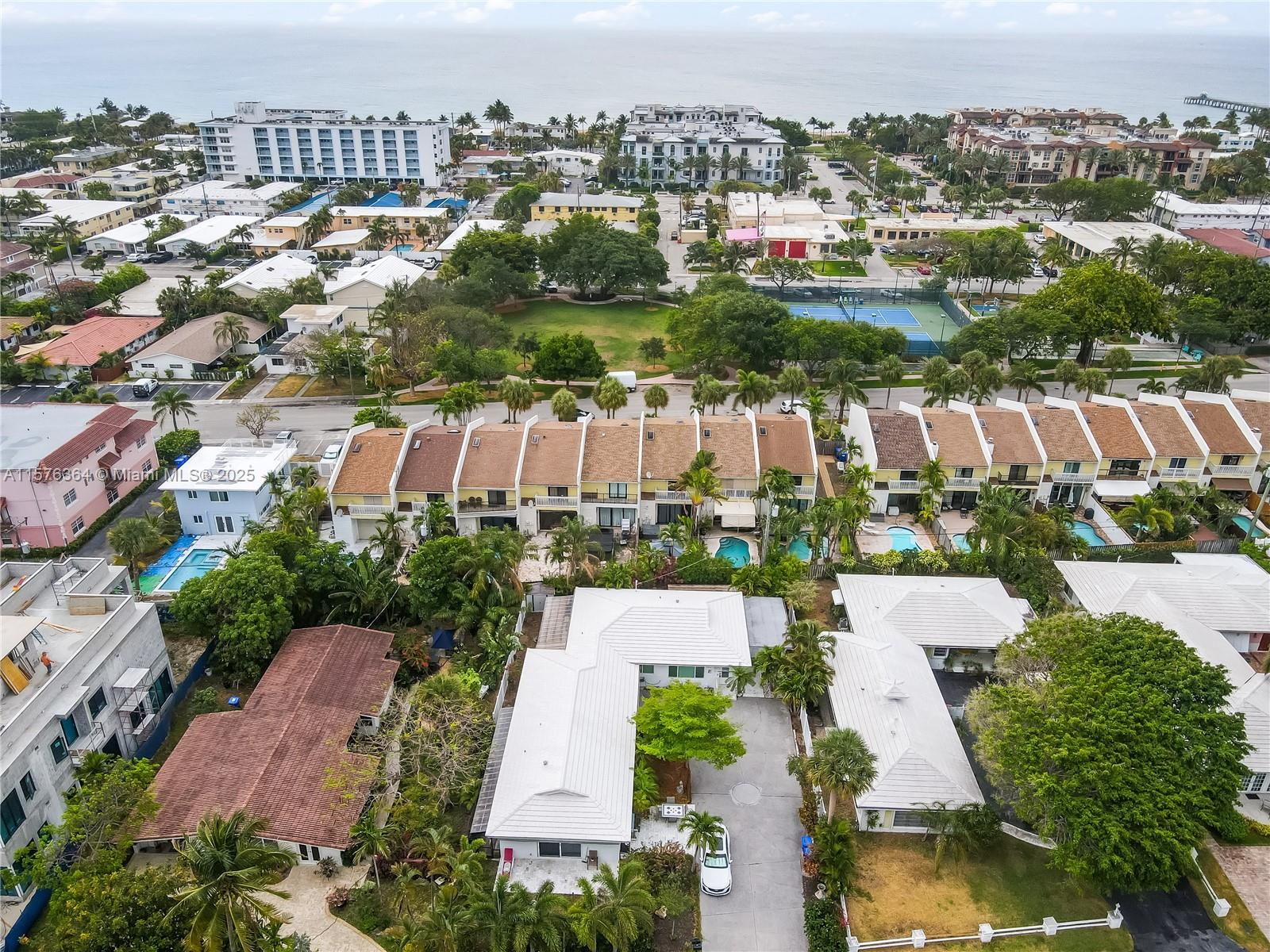 Location. Investors dream. Mother and daughter. Updated duplex in prime location, walk to all. 2019 tile roof, 2018 hurricane windows, and newer central heat and air conditioning. The home sits on a large lot with lush tropical gardens just steps to the beach, shops, dining and entertainment. The 2/2 is rented at $4000 with a year lease in place. features 2 large bedrooms, 2 newer baths, gorgeous terazzo floors, updated kitchen, living room, huge sun room or family room, 2 screened patios and washer dryer in unit. Unit 1 is rented under market at $3000. The property has 2 car garage and patios space all around. Can build to make more units.