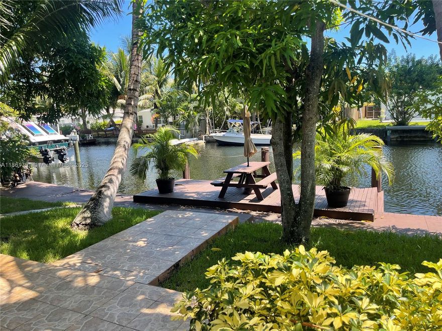 Welcome to this pristine Hollywood home with a beautiful intracoastal view. This home is quite suitable with its very own chimney, its own boat dock and a relaxing view if you just need to sit back and relax! This 3 bedroom 3 bath cozy home is ready for you to move in. Located in the East of Hollywood in a very quiet neighborhood, lots of parking space and is being sold furnished. The living room leads you to the intracoastal view with a screened patio and has great accessibility to park your boat on its own dock. The roof is still under warranty and is being newly painted! Interested in taking a look? Please contact listing agent for showings! Free boat parking on the dock, attached to the house.