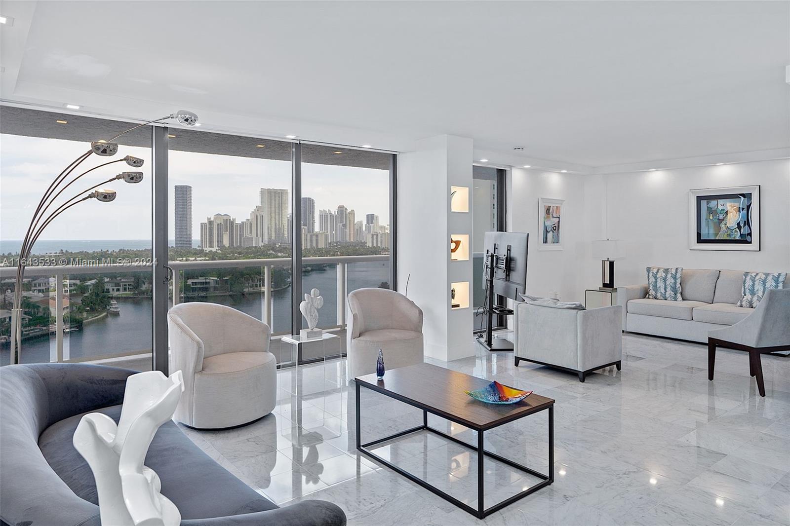 RARE!!A real gem!! High floor. Beautifully remodeled 2 Bed 2 Bath condo, open space of 2 bedroom. All Marble floor, With many upgrades, Waterfront building on most desirable street address in Aventura, Country Club Drive. Unobstructed direct ocean and intercostal view. Breathtaking water views from each of the rooms. Split plan, washer and dryer in unit. Huge baloney accessible from each bedroom. Extra storage space. Building just finished 40 years recertification with major renovation and building a brand new pool with new amenities.,
A must see.