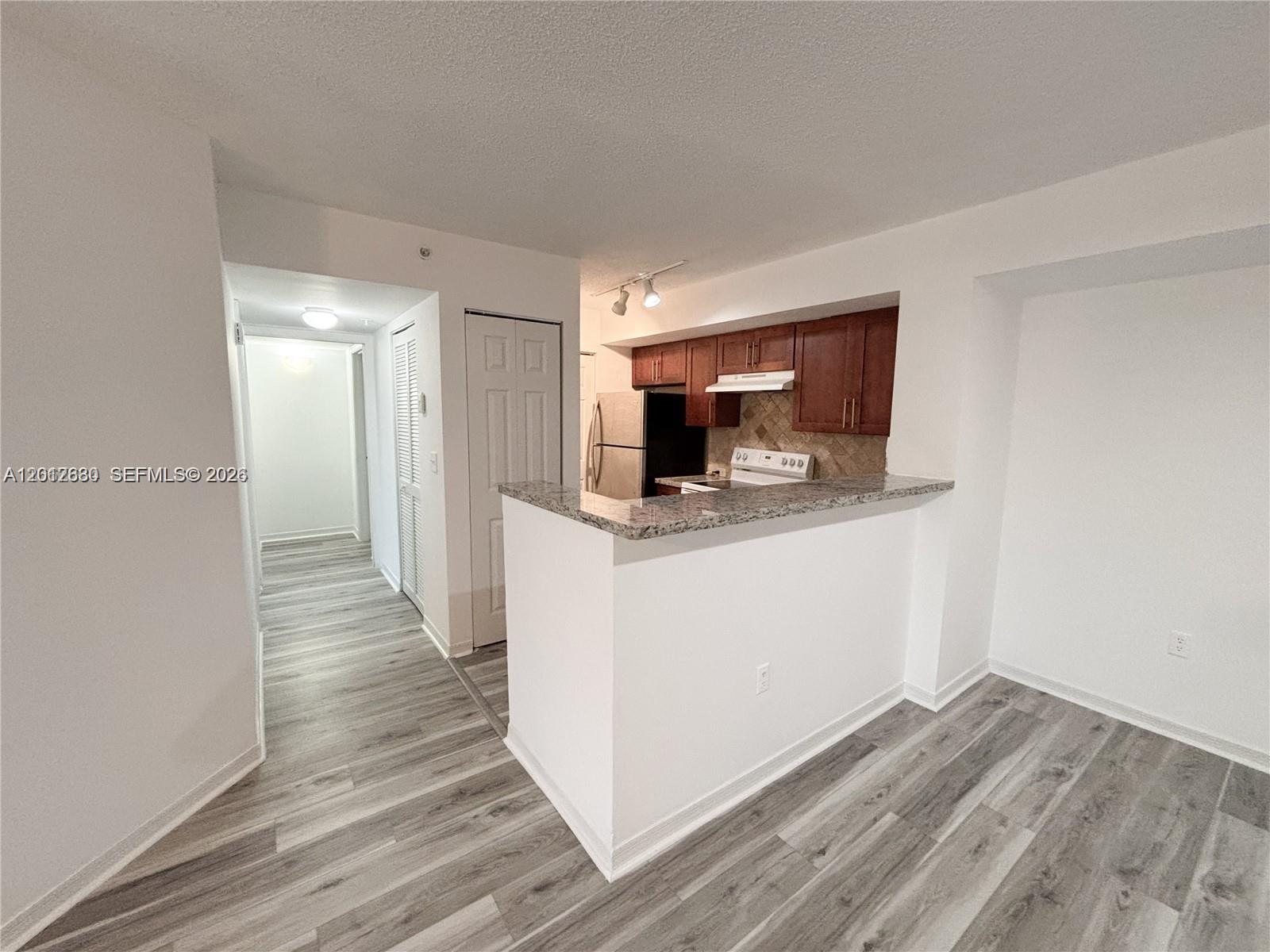 DEVONAIRE CONDO AT PEMBRO - Residential