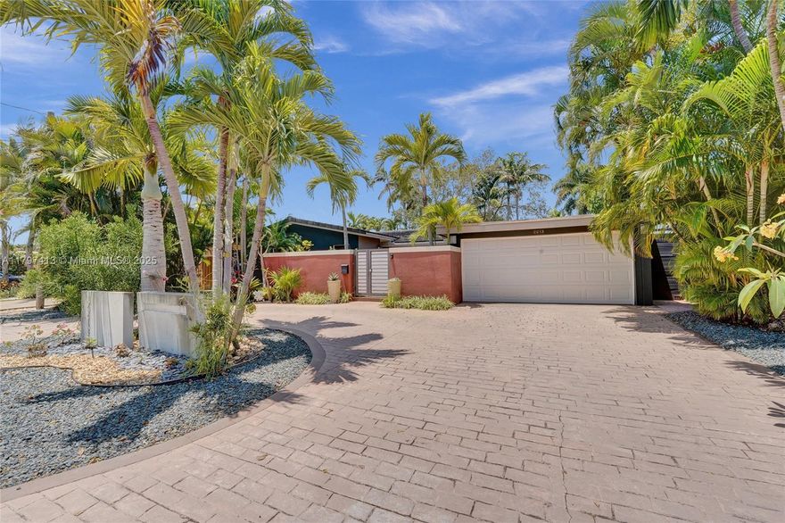 Modern retreat in the heart of Wilton Manors! 3 Bed/3 Bath which includes a Mother-in-Law Suite, spanning 2,200 square feet. The open layout seamlessly connects indoor and outdoor living. The heart of the home is the chef-inspired open kitchen, outfitted with granite countertops, gas range, stainless steel appliances, and a sleek bar area, perfect for both everyday living and entertaining. Step outside to your own tropical oasis, where a sparkling pool is surrounded by lush landscaping, creating a serene backdrop for relaxing or hosting gatherings. Whether you’re looking for a full-time residence, vacation escape, or an income-producing opportunity with the Mother-in-Law suite, this home delivers on every level. Don’t miss your chance to own a slice of paradise.