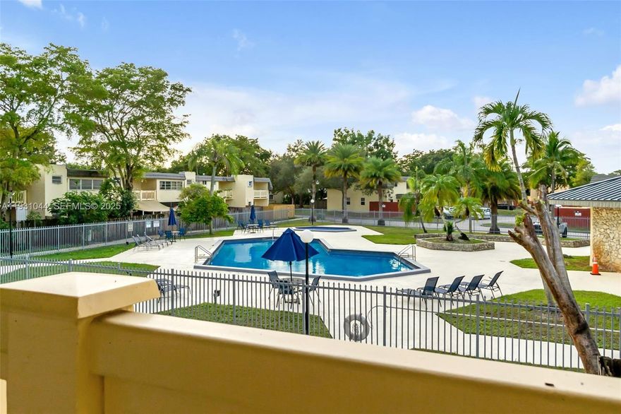 Fully renovated from top to bottom, this property offers incredible value with high-ticket upgrades, including impact windows and doors, a gourmet kitchen, washer/dryer, new A/C, tankless water heater, and much more. The immaculate interior features spa-inspired bathrooms. Outside, enjoy a welcoming front patio and a fully fenced private backyard with no rear neighbors that leads directly to the pool area. Parking is effortless with two dedicated spaces directly in front of your door, with plenty of guest parking. This home is vacant, easy to show, and perfect for a fast move-in.