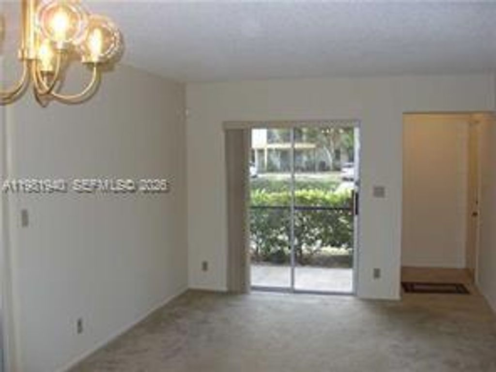 Photo of 107 Gardens Dr #106, Pompano Beach, FL 33069 (MLS # A11981940)