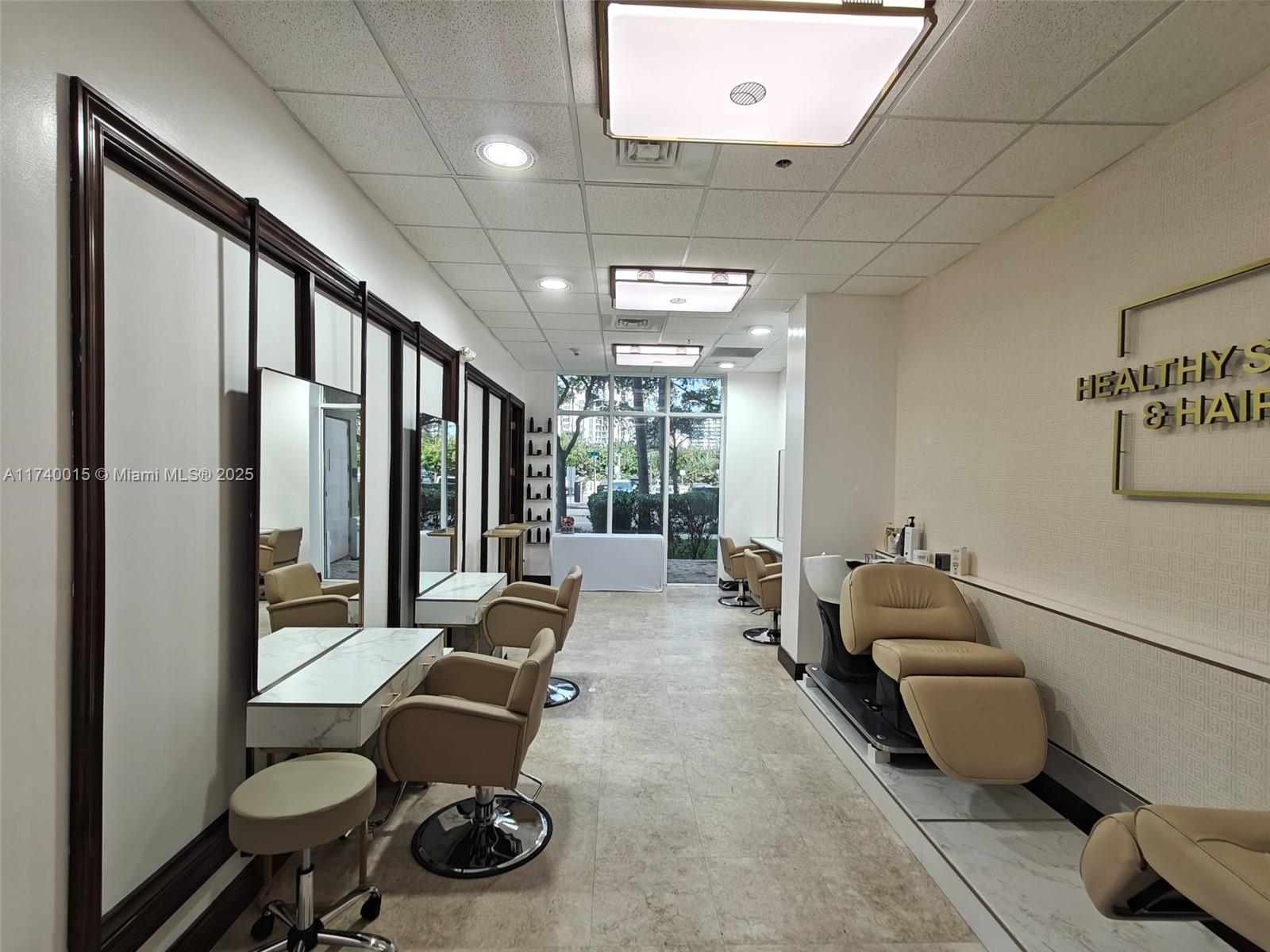 A unique class A commercial property on the Intercostal. Brand new hair salon 1,100 Sq. Ft, fully equipped and ready for work. The salon has 5 hair stations + 1 in a big private room for hair spa and trichology. One facial room . Two hydraulic shampoo bowls and other brand new equipment. Business has its own personal Website. The rent is NN (maintenance and taxes will be paid by the tenant. Tenant to purchase from landlord an equipment of $20K. Minimum 3 years rent with option to extend.
The building is located in a more than ideal location, across from Shooters Restaurant with high visibility and traffic, corner unit and with a possibility of advertising space on all windows. The luxury building offers valet parking as well as 4 deeded parking for the owners of the commercial units.