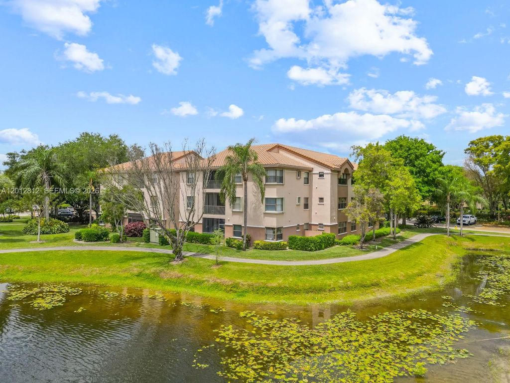 Photo of 4350 NW 30th St #333, Coconut Creek, FL 33066 (MLS # A12012812)