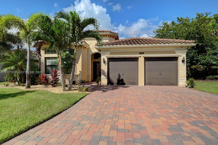 Nestled in the guard-gated, resort-style Bridges of Delray, this single-story Paseo model, built in 2014 and hardly lived in, is in like-new condition and sits on a rare private ¼-acre corner lot offering unmatched privacy with no neighbors to the right, behind, or directly in front. Meticulously maintained, the home features 3 bedrooms, 3.5 baths, plus a large den/office with windows and a door (can be used as a 4th bedroom), a gourmet kitchen with 2 islands, upgraded appliances, wet bar, porcelain and bamboo floors, central vacuum with kitchen sweep (toe-kick dustpan), hurricane-impact windows and doors, and a whole-house generator connected to the city’s natural gas supply for seamless, unlimited runtime during any outage. Living spaces flow seamlessly to the outdoors, which boast a heated whirlpool pool with a dual pump system, a covered screen-enclosed patio, cabana bath, outdoor shower, and an extra-long paver driveway on a professionally landscaped ¼-acre lot with automatic HOA sprinklers. Architectural exterior lighting highlights the home’s design and mature landscaping at night. Residents enjoy resort-style amenities including a clubhouse, fitness center, Har-Tru clay tennis courts with tennis pro, indoor and outdoor basketball, resort pool and hot tub, poolside restaurant, yoga studio, sauna, splash pad, and playground. Just 3 miles to Delray Marketplace and 12 miles to the ocean. Move-in ready, this home perfectly blends privacy, luxury, and resort-style living.