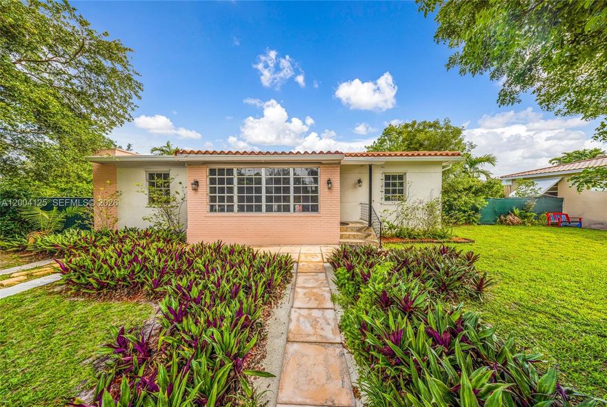 Charming ranch-style home located in the heart of Miami Springs featuring 3 bedrooms and 2 bathrooms across 1,345 square feet of comfortable living space. This residence offers an inviting open floor plan that enhances natural flow and functionality, ideal for everyday living and entertaining. Situated on a spacious 9,875 sq ft corner lot with convenient alley access, the property provides ample outdoor space with a large backyard perfect for future customization, recreation, or outdoor gatherings. A fantastic opportunity to enjoy classic Miami Springs living with room to make it your own.