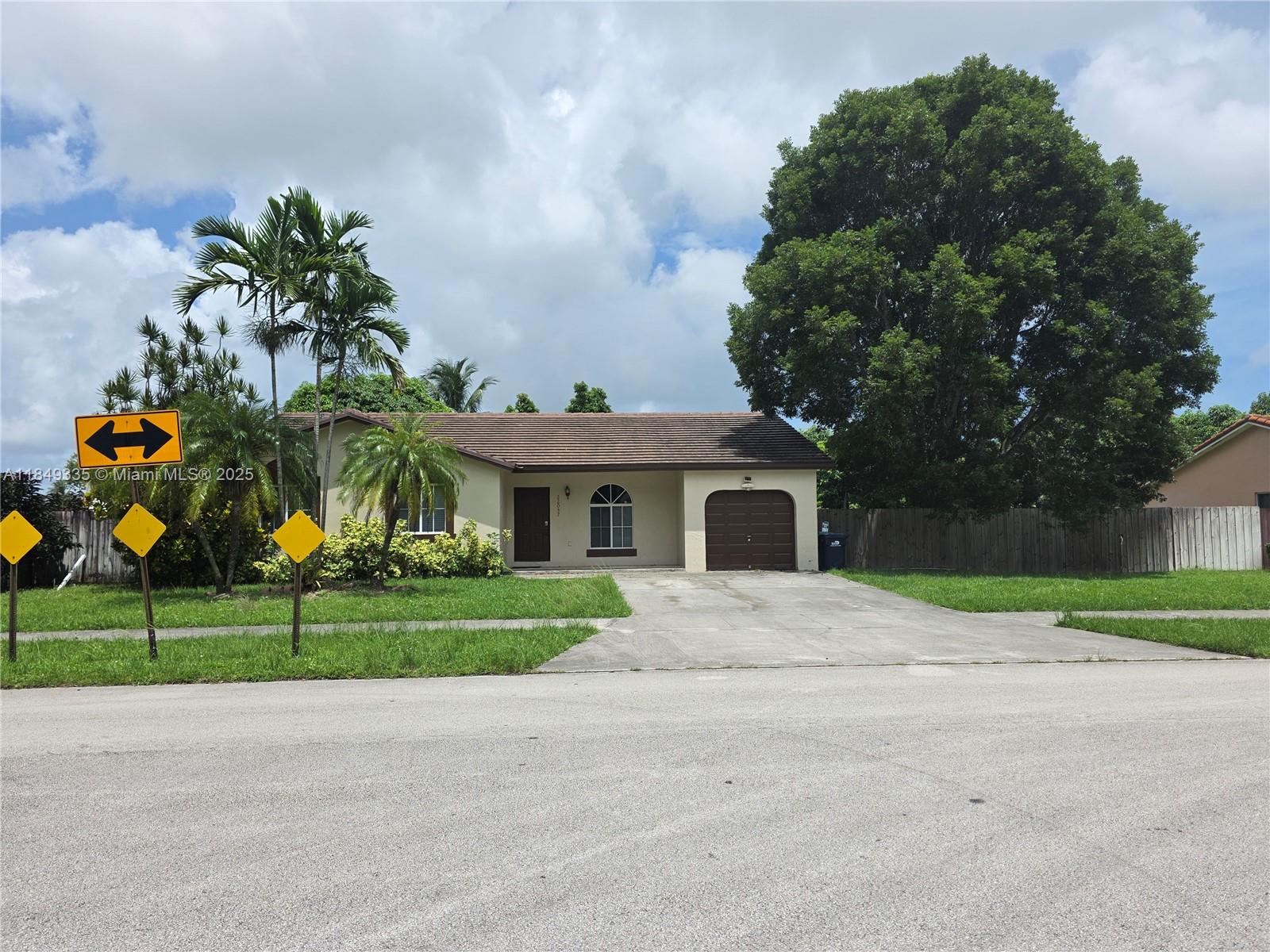 Nice SF, 3 Bed 2 Bath home, 1-car garage, tile floors throughout. This cozy home is located in a tranquil neighborhood, large screened porch and a big green backyard with fruit trees. Home is zoned EU-M. Lot size is 0.284 acre/ 12,500 ft. This home is near schools and shopping center.
