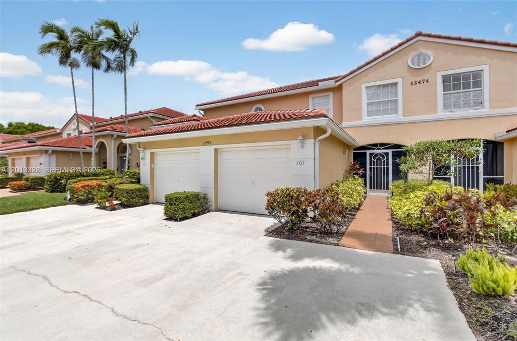 Photo of 12474 Crystal Pointe Dr #101, Boynton Beach, FL 33437 (MLS # A12013328)