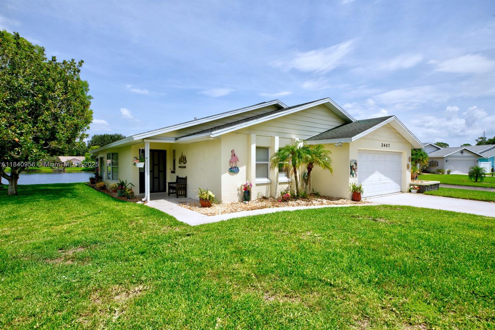 Enjoy stunning sunsets from this waterfront home located in the desirable Golf Hammock neighborhood. This charming 2-bedroom, 2-bath residence offers the perfect balance of space and comfort. Both spacious bedrooms feature walk-in closets, and most areas of the home boast beautiful lake views. Highlights include an attached two-car garage and a spacious screened-in patio stretching over 40 feet, ideal for relaxing while overlooking the tranquil lake. Whether you're looking to downsize or find a peaceful retreat, this home’s prime location—just steps from the Golf Hammock Golf Course—makes it a truly special place to call home.