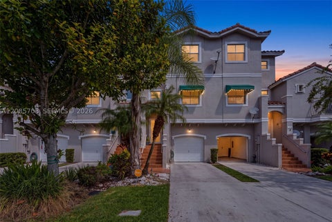 Photo of 1354 NW 126th Way, Sunrise, FL 33323 (MLS # A12085703)
