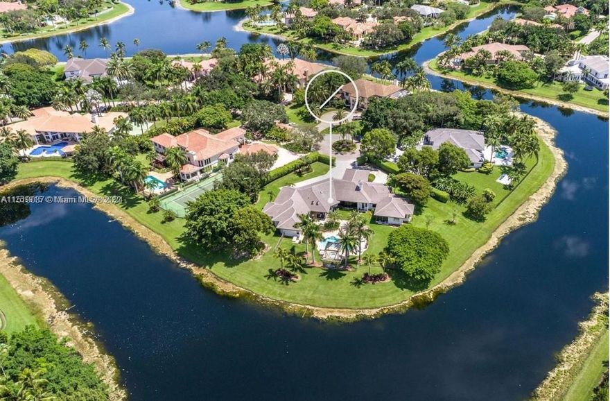 Highly renovated estate on a private 58,000 SF cul-de-sac lot w/ endless water views in prestigious Windmill Ranch Estates. New travertine circular driveway, 4 car garage & porte cochere welcomes you! Smart home w/ brand new roof, impact glass windows & doors, marble floors & custom millwork throughout. 5 bedrooms, 6 1/2 baths, master suite w/ large walk-in closets, master bath w/ spa & sauna. New chef's kitchen w/ top of the line Viking appliances - Viking 60" gas range, Sub Zero refrigerator. Formal living room w/ wet bar, fireplace, volume ceilings & picture window displaying endless water & sunset views. Resort style backyard w/ heated pool & spa, extensive new travertine pavers & summer kitchen.