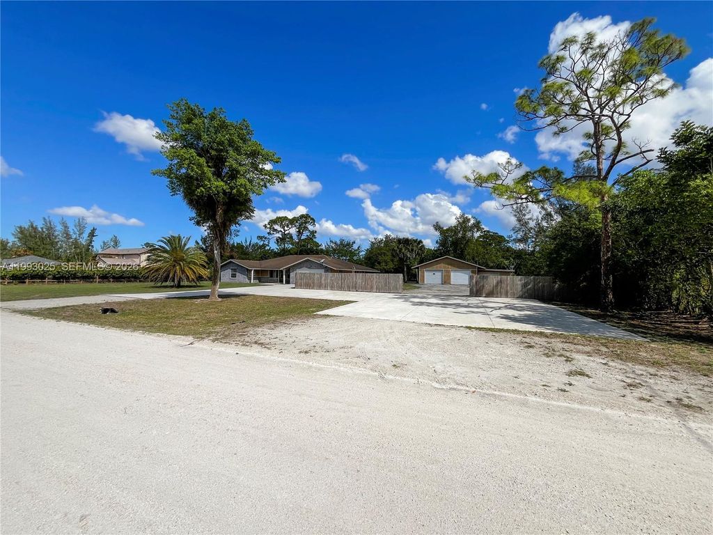 Photo of 13587 N 77th Pl N, Other, FL 33412 (MLS # A11993025)