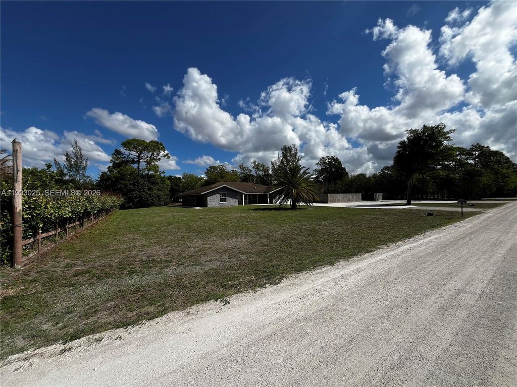 Photo of 13587 N 77th Pl N, Other, FL 33412 (MLS # A11993025)