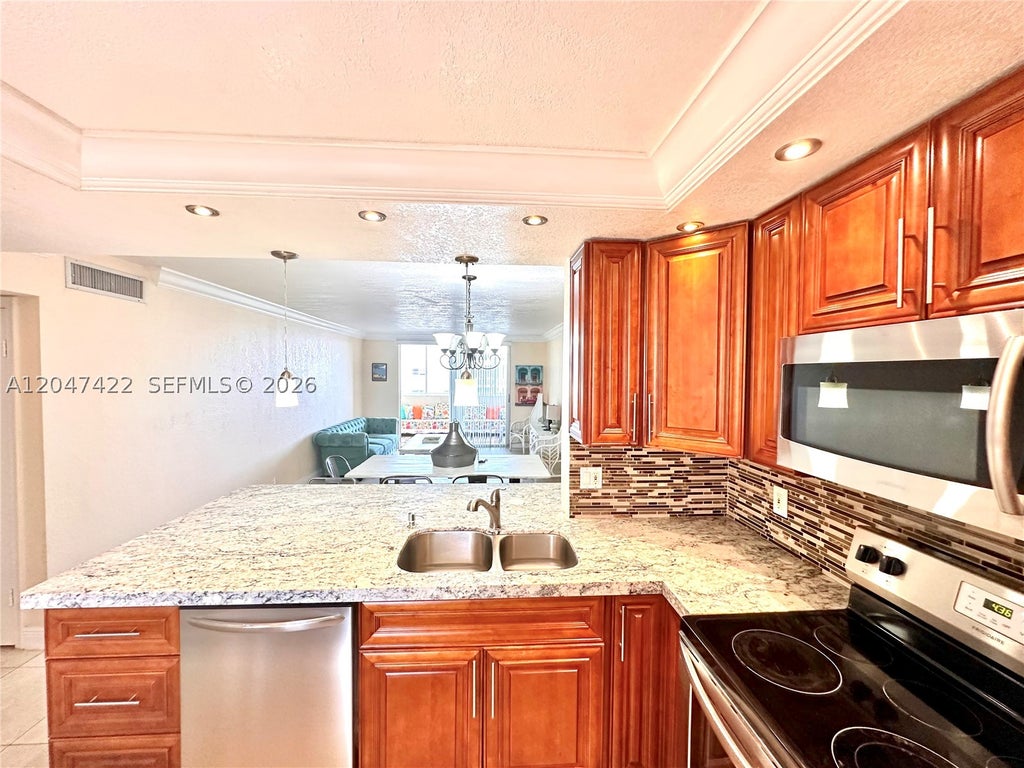 Photo of 500 NE 12th Ave #705, Hallandale Beach, FL 33009 (MLS # A12047422)