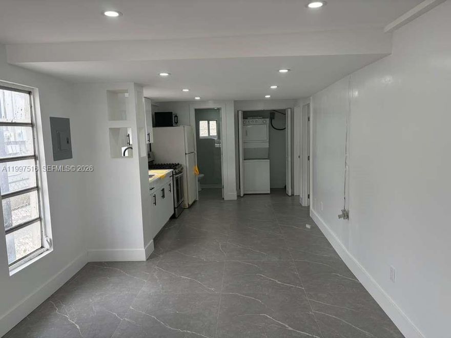 Stunning, fully remodeled 3-bedroom, 1-bath residence in the heart of Little Havana. This move-in-ready unit has been beautifully updated throughout and features a bright, open layout, elegant large-format tile floors, a sleek modern kitchen, a beautifully renovated bathroom, and an in-unit washer and dryer for added convenience. Filled with natural light and finished with a clean contemporary feel, this home offers both style and functionality in a prime location near major roads, shopping, dining, and all the charm and energy of Little Havana.