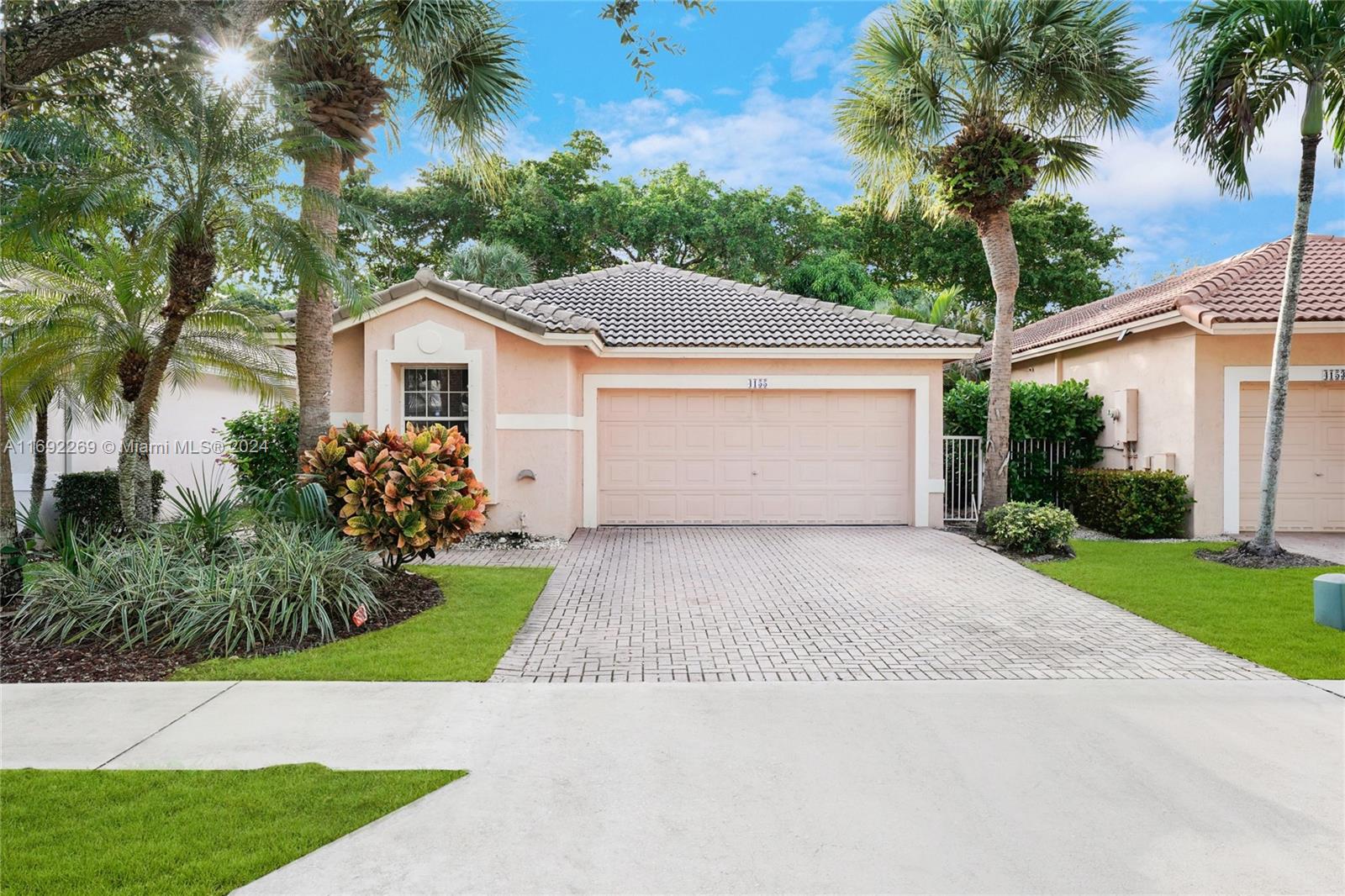 Welcome to Emerald Estates in Weston. This one-story house features three beds and two remodeled bathrooms, completed in 2022, two-car garage, brand-new A/C unit: vaulted ceilings and abundant natural light. The kitchen and floors were fully renovated in 2018. Outside, the patio provides ample space for adding a pool and creating your private oasis. 24-hour security, alarm, as well as the convenience of lawn maintenance, irrigation, garbage collection, fiber optic internet, and basic cable included with the HOA dues. Amenities are currently being renovated and include a new pool, gym, and children’s playground. Top-rated schools and quick access to I-75. Don’t miss this opportunity to be part of this beautifully maintained community in Weston, a city designed for family living.