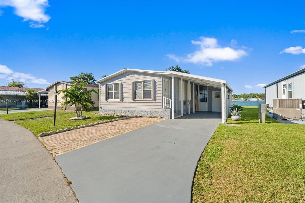 Photo of 5305 nw 202 Terrace, Miami Gardens, FL 33055 (MLS # A11906738)