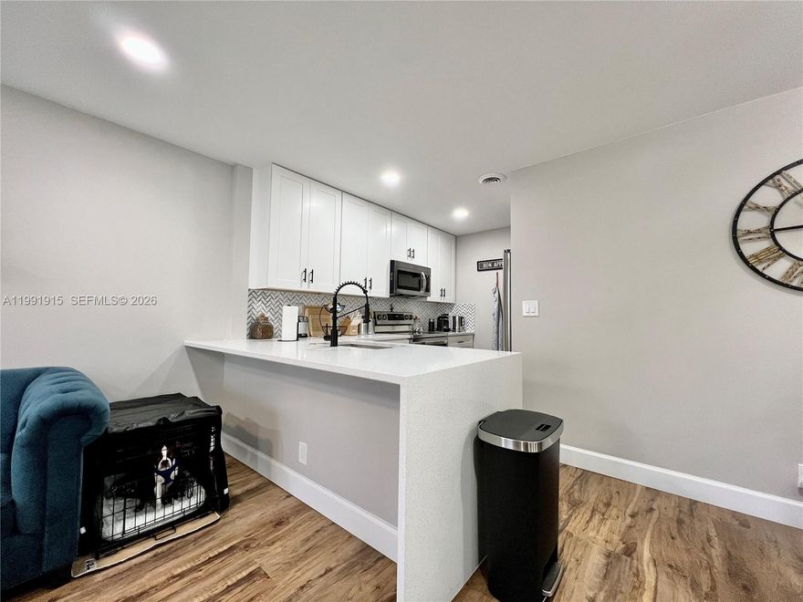 INVESTOR OPPORTUNITY - Completely renovated 2-bedroom, 2-bathroom condo where no expense was spared—this is not your typical unit. Featuring a high-end modern kitchen with stainless steel appliances, new vinyl flooring throughout, and beautifully upgraded bathrooms with quality finishes. Additional highlights include a newer A/C system, in-unit stainless steel washer and dryer, hurricane shutters, and a screened front porch. Excellent investment opportunity with strong rental appeal. ideal Property for an investor or for an end-user to move in without delay. 
Pet-friendly community (dogs up to 25 lbs) and all ages welcome. Enjoy resort-style amenities including a community pool and tennis courts within walking distance. Prime Sunrise location close to top-rated schools, shopping, dining, and major highways.  
Turnkey condition—no updates needed. Easy to show by appointment.