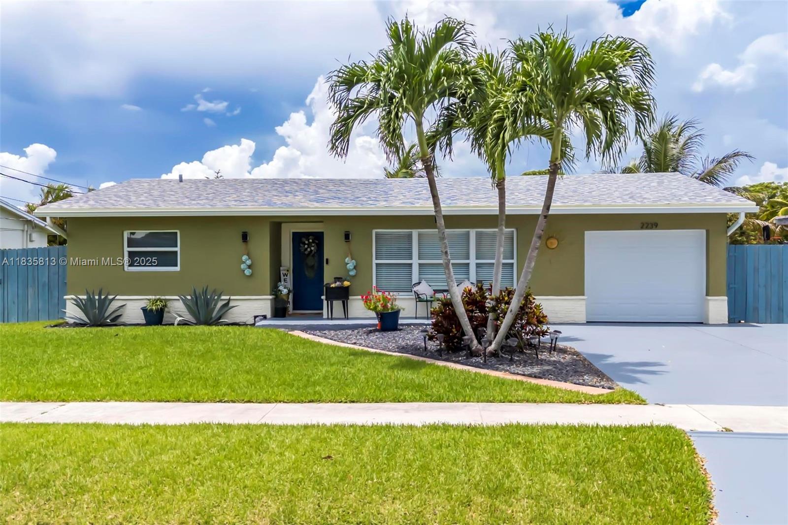Make this gorgeous 3/2 waterfront pool home yours today! This lovely home has everything you need. Relax in the backyard by the pool overlooking the lake. Updates throughout the entire house. Large family room overlooking the pool and water. New roof, new AC unit, new water heater. Primary suite features large custom bathroom which cabanas out to the pool area. Bathroom fully updated accompanied with a bidet and his and hers sinks. Hurricane Impact windows throughout the whole house including doors. Washer and dryer in the garage. Covered patio with bar area all overlooking the pool and water. Pool features a spillover spa. Don't miss out on this gem!!