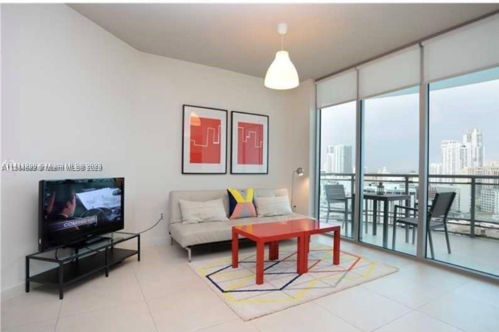 This residence offers a perfect blend of design, modern amenities, and living experience in the heart of the city. The kitchen is equipped with stainless steel appliances, sleek granite countertops, and ample cabinetry for all your culinary needs. The dining area adjacent to the kitchen provides a comfortable space for gathering with friends and family. Step outside onto the private balcony, where you'll be captivated by the stunning vistas that stretch across the cityscape. The master bedroom features a generous closet space, en-suite bathroom, and floor to ceiling windows. Enjoy access to the Wind's amenities, including fitness center, swimming pool, and spa. The building's prime location puts you in the heart of Brickell's trendy restaurants, shopping, and cultural attractions.