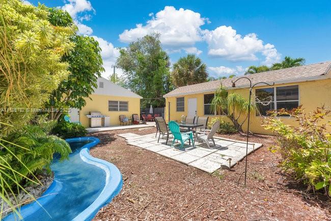 SELLER GIVING a $10k CREDIT to buyer that can be used to BUY DOWN the INTEREST RATE, updates or towards closing costs!!! Welcome to your tropical paradise in the charming & historic district of Lake Worth Beach! This 5-bed, 2-bath (2/2 main + small Bed/Office + 2 Bed Efficiency) w/ wading pool & no HOA, is perfect for a family or investor to Airbnb. Roof 13 yrs, AC 9 yrs, updated plumbing. Located E of Fed Hwy, a short stroll to a vibrant & artsy downtown w/ restaurants, shops, cafes & more. 1 block from Intracoastal & Bryant Park w/ access to amphitheater, boat ramp, fishing pier, nature walk, dog park, recreation areas & BBQ. Beach is a quick walk across the Lake Worth Bridge, where you can enjoy the fishing pier, oceanfront dining, beach access & a community pool.