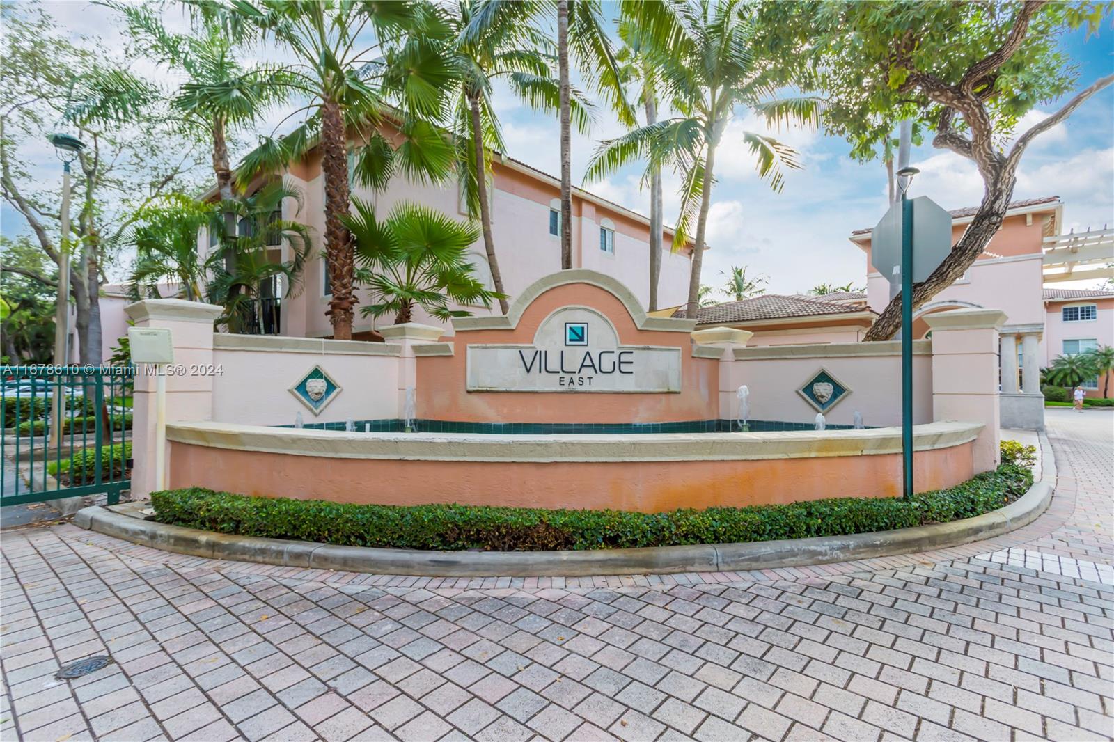 Welcome to the gated, secured Village East, first floor corner unit. Renovated with custom designer touches throughout this beautiful flowing spacious open floor plan. Stunning from the moment you walk in, seeing the perfect blend of luxury and comfort, designer kitchen with details, including a wine cooler. Wide trim, and window treatments throughout. great patio. There are two expansive primary suites, each with closets. Enjoy grilling by the pool area. Just minutes from the beach and airport, and within walking distance to shops and restaurants. It is pet friendly, has guest parking, and plenty amenities, pool, fitness center, conference room, and a car wash area with coin vacuum. Come see this condo that offers the perfect blend of luxury, comfort, accessibility, and amenities.