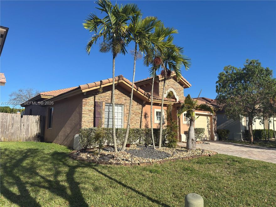 Well-maintained 3-bedroom, 2.5-bath home in Cutler Bay featuring an open living area that enhances the flow of the main spaces, making it ideal for both everyday living and entertaining. The split floor plan offers a practical layout with separation between living and bedroom areas.

The kitchen has been updated with new countertops, backsplash, newer appliances (2020), and a farmhouse-style sink. Flooring includes large porcelain tile in the living areas and gray laminate wood flooring in the bedrooms.
Recent improvements include a new HVAC system (2025). The property is also equipped with an EV charger.
This home has had only two owners and has been consistently maintained. The backyard is fully fenced, providing privacy and a flexible outdoor space with room for future customization.
