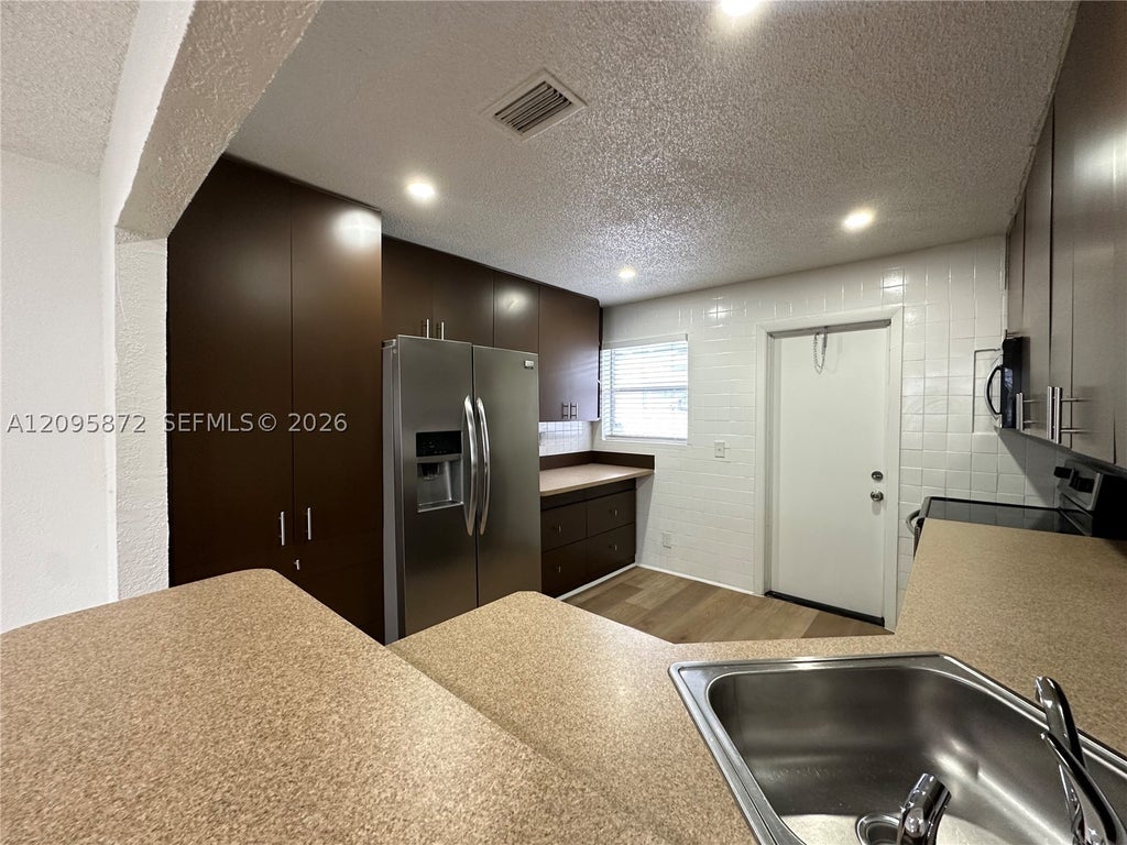 Photo of 124 NW 2nd Ave #A, Hallandale Beach, FL 33009 (MLS # A12095872)