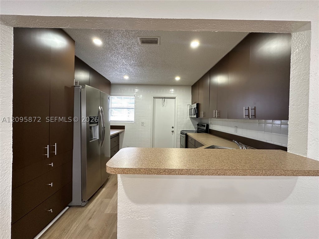 Photo of 124 NW 2nd Ave #A, Hallandale Beach, FL 33009 (MLS # A12095872)