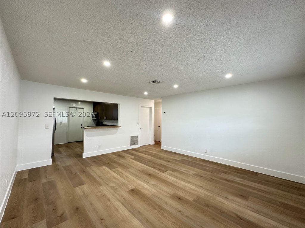 Photo of 124 NW 2nd Ave #A, Hallandale Beach, FL 33009 (MLS # A12095872)