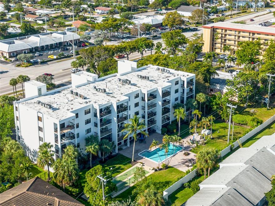 Fully Upgraded 2/2 Condo Near Pompano Beach! Welcome to Mariners Way, a boutique 28-unit building just minutes from the beach! This corner unit boasts luxury vinyl flooring, remodeled bathrooms, smart lighting, USB-C outlets, Bluetooth exhaust fans, new blinds, and full closet systems. Enjoy an upgraded kitchen with a new dishwasher and plumbing fixtures, plus in-unit washer/dryer, impact windows, and a private balcony overlooking the pool. Live steps from Atlantic Blvd hotspots, golf, the aquatic center, shopping, and more! Includes updated door hardware, dimmer switches, hammer arrestor on washer, and all new supply lines. Walk-in master closet and spa-style guest shower add comfort and elegance. Ideal for full-time living or a stylish vacation getaway!