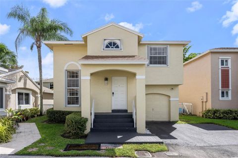 Photo of 11862 NW 13th St, Pembroke Pines, FL 33026 (MLS # A11881950)