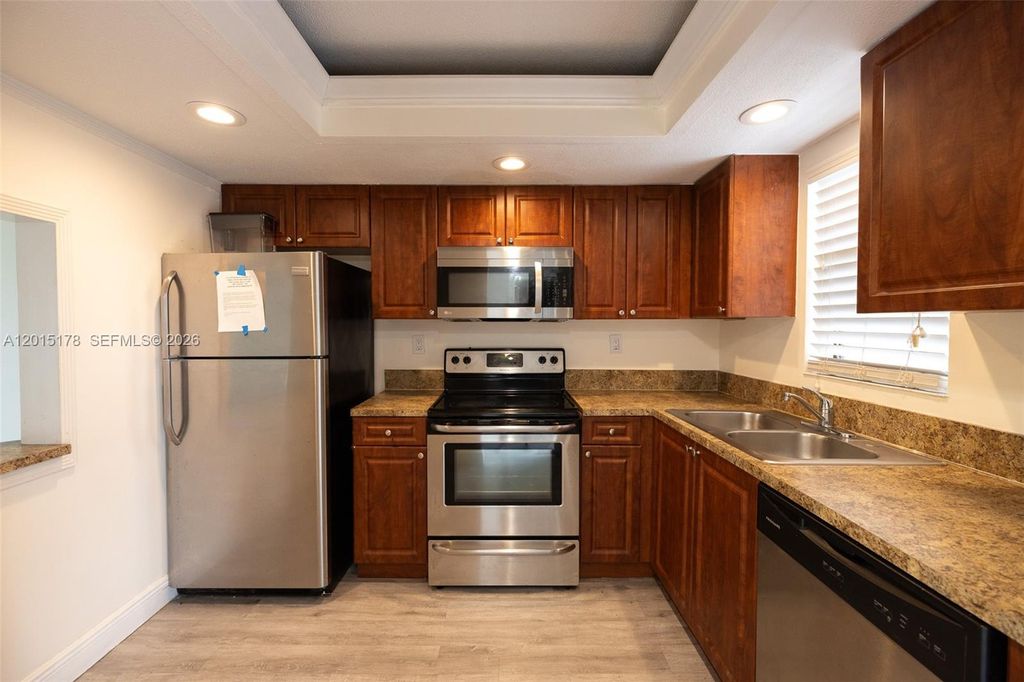 Photo of 9235 SW 8th St #403, Boca Raton, FL 33428 (MLS # A12015178)