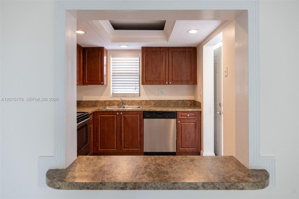 Photo of 9235 SW 8th St #403, Boca Raton, FL 33428 (MLS # A12015178)