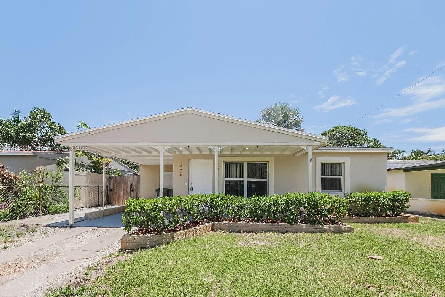 Enjoy the ease of single-story living in this charming 2 bedroom 1 bathroom rancher, which is a great opportunity in north Andrews Gardens. Step from the Welcome mat into an interior embrace that includes a grand entryway, an open layout, natural light, stylish fixtures, trim molding and neutral decor. The property features tiles floors throughout, living, dining and family, laundry, open concept kitchen with SS appliances and granite counter tops plus bedrooms that are unique, quiet and rich with ample wardrobe storage. The exterior includes a covered carport, open porch, patio and large fenced in yard big enough for a pool. Priced to sell and easy to show.
