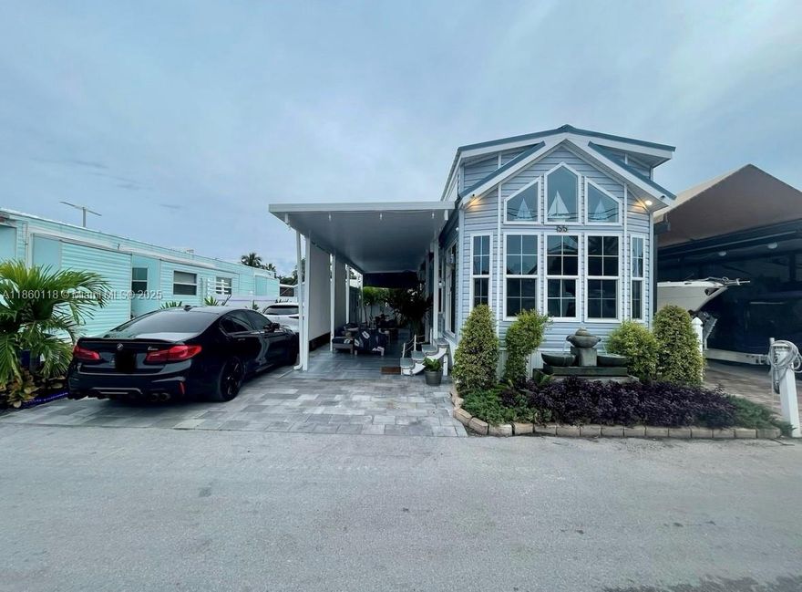 Turn Key AirBnB Investment property with rentals from 1 to 365 days or your own personal getaway in beautiful Key Largo. Park your boat in your own paved and tiled driveway and launch it in the community boat ramp. Enjoy spending time under the aluminum pergola with drop down shades for added comfort and privacy, while you process and BBQ your catch from a day of fishing. Large Shed on the property to store all your equipment on the property. Once you step inside the 2018 RV the high ceilings and modern finishes is the place welcome you and you will feel right at home. With a Washer and Dryer in the property you will have all the comforts and conveniences you are looking for. The property can come furnished or unfurnished.